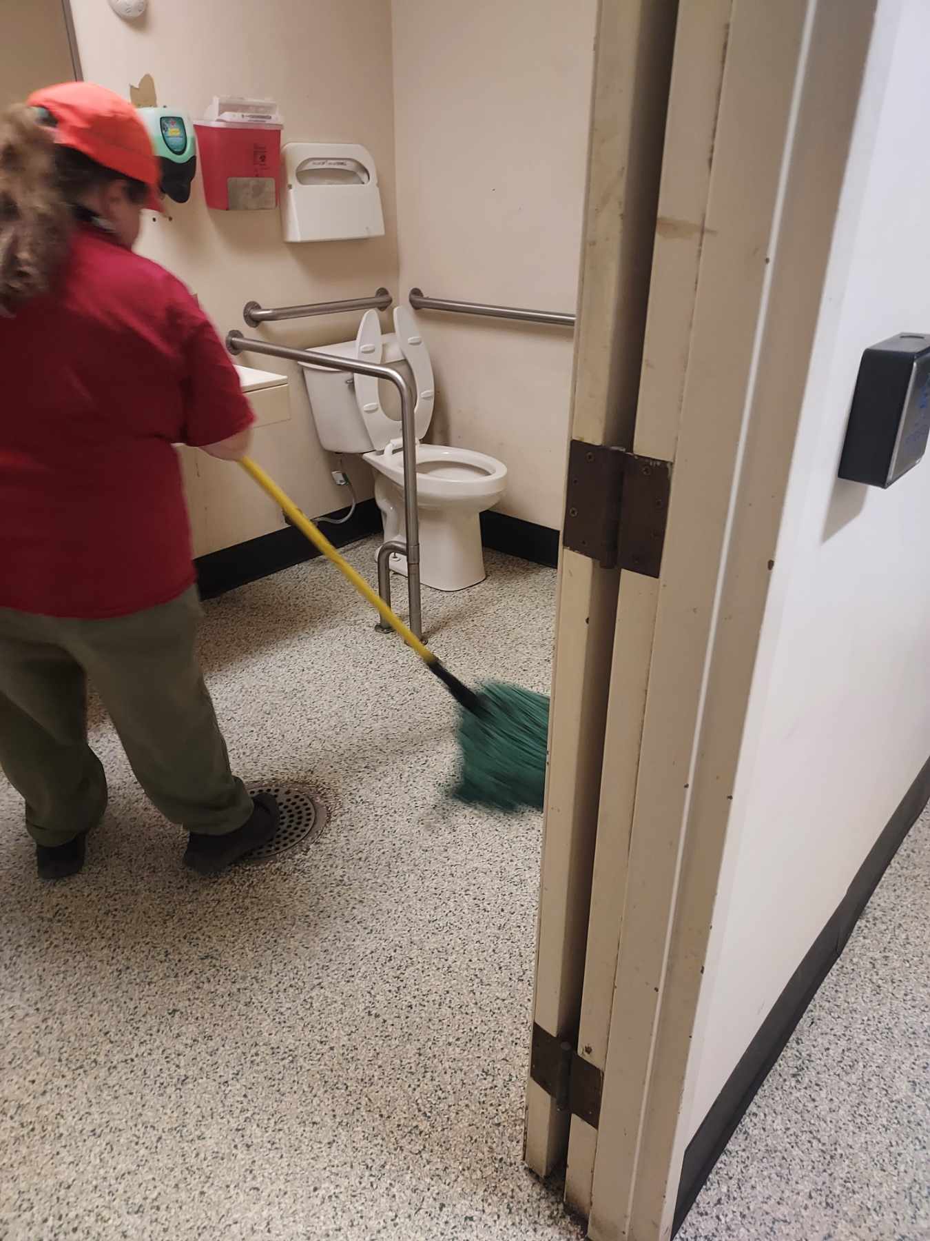 Woman Cleaning Sink